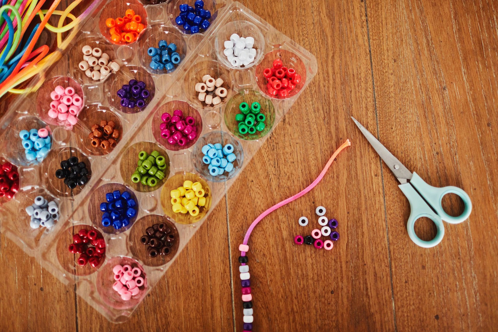 Beads arranged for a children's craft project